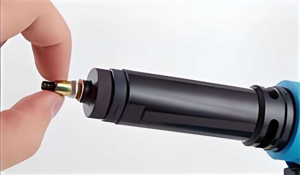 After rotating in, hold the triggerand the rivet nut gun will pull back todeform the nut - Rocol Tools